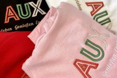 AUX-Hoodie in schwarz, rot, weiß und rosa copyrightsandsackfotografie